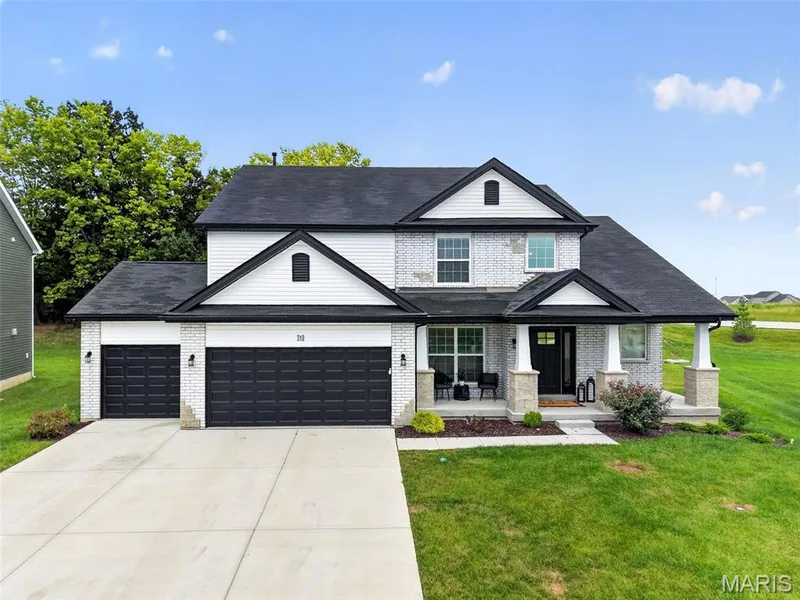 All the luxury of new construction, without the wait, see it today! — 310 Osprey Court, Lake St. Louis, MO 63367