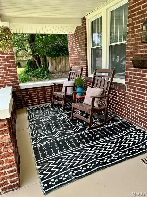 Covered front porch — 915 N Kingshighway Street, St Charles, MO 63301