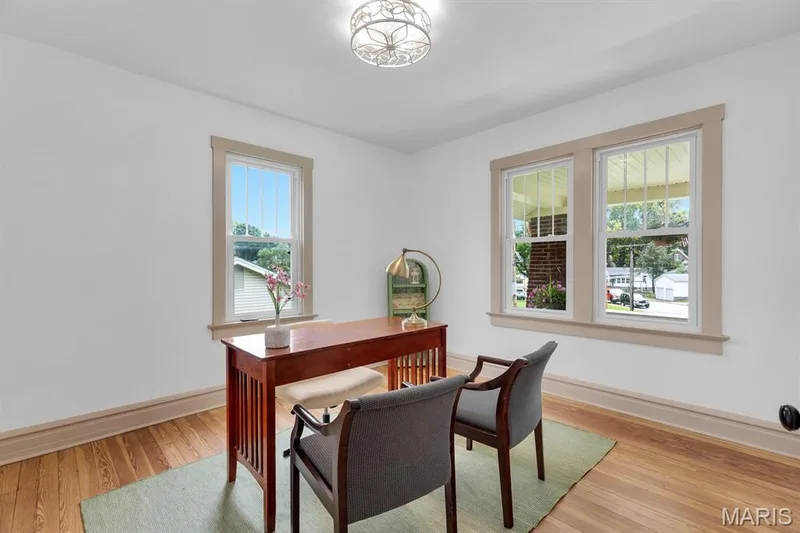 Main floor bedroom staged as an office — 915 N Kingshighway Street, St Charles, MO 63301