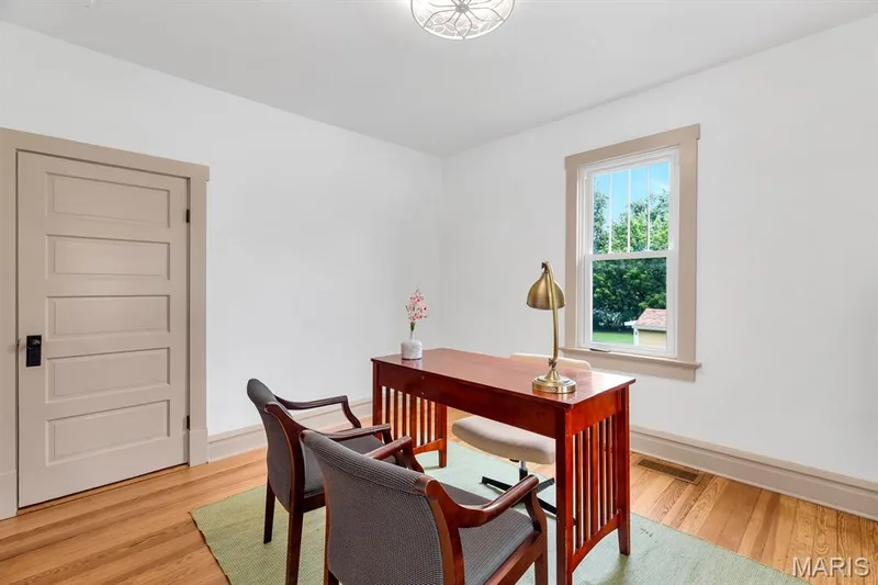 Main floor bedroom staged as an office — 915 N Kingshighway Street, St Charles, MO 63301