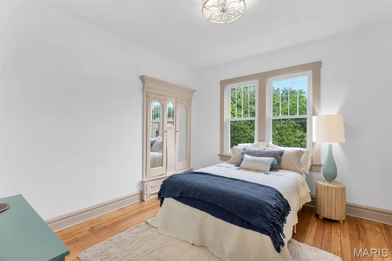 Main floor bedroom with restored, original built-in armoire/wardrobe — 915 N Kingshighway Street, St Charles, MO 63301