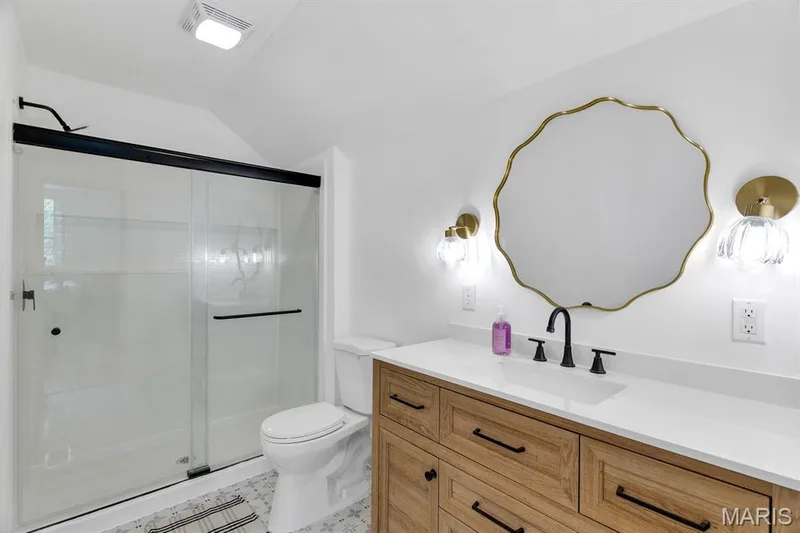 Master bathroom with 48" vanity & ceramic tile.  White painted wood ceiling — 915 N Kingshighway Street, St Charles, MO 63301