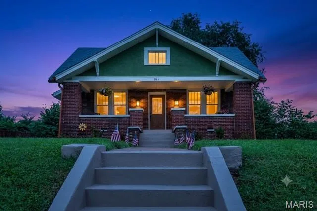 Front Porch Lanterns have a fire burning glow/flame flicker.  Back Porch Lantern is dusk to dawn lighting and always on at nighttime. — 915 N Kingshighway Street, St Charles, MO 63301