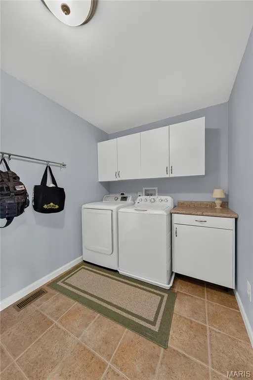 Laundry Room Located off of Kitchen — 132 Riverdale Woods Circle, O'Fallon, MO 63366