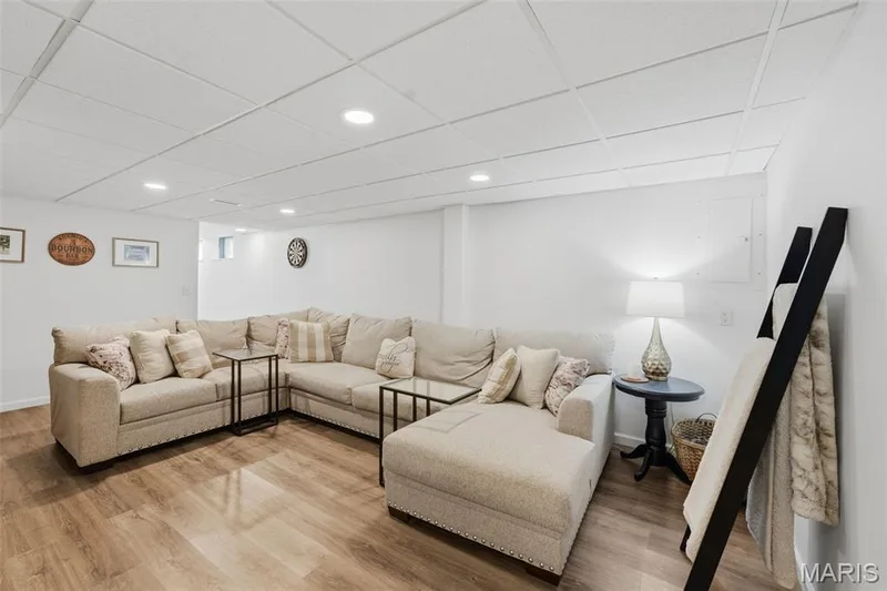 Living area in the basement. — 17 Oak Hill Lane, St Peters, MO 63376