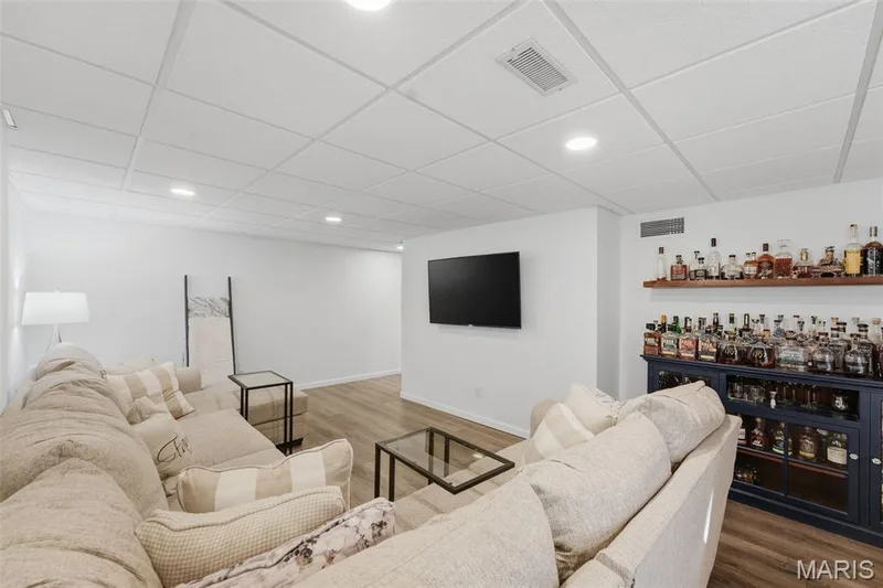Living area in the basement. — 17 Oak Hill Lane, St Peters, MO 63376