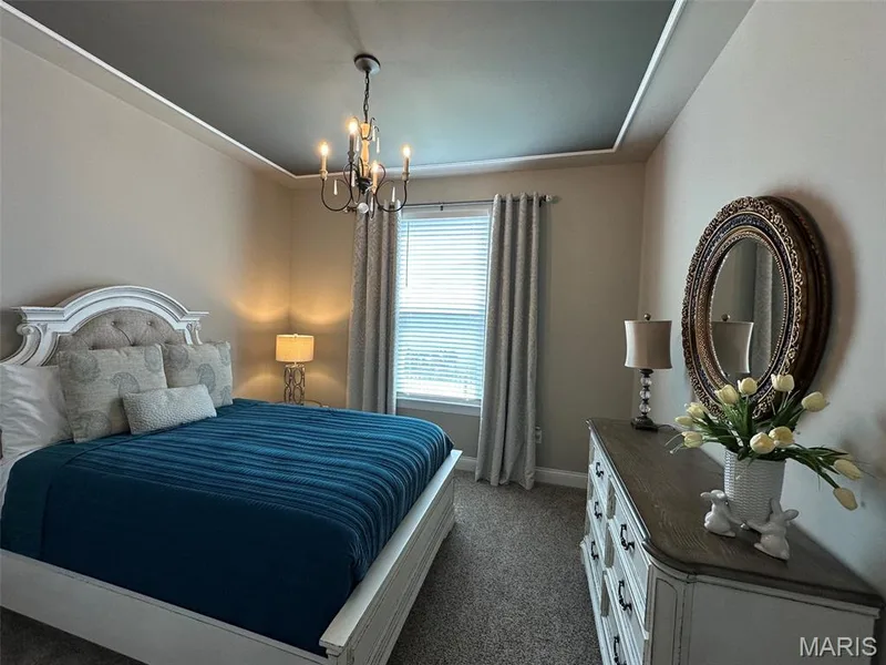 Recessed tray ceiling with a central chandelier — 110 Alta Mira Court, Dardenne Prairie, MO 63368
