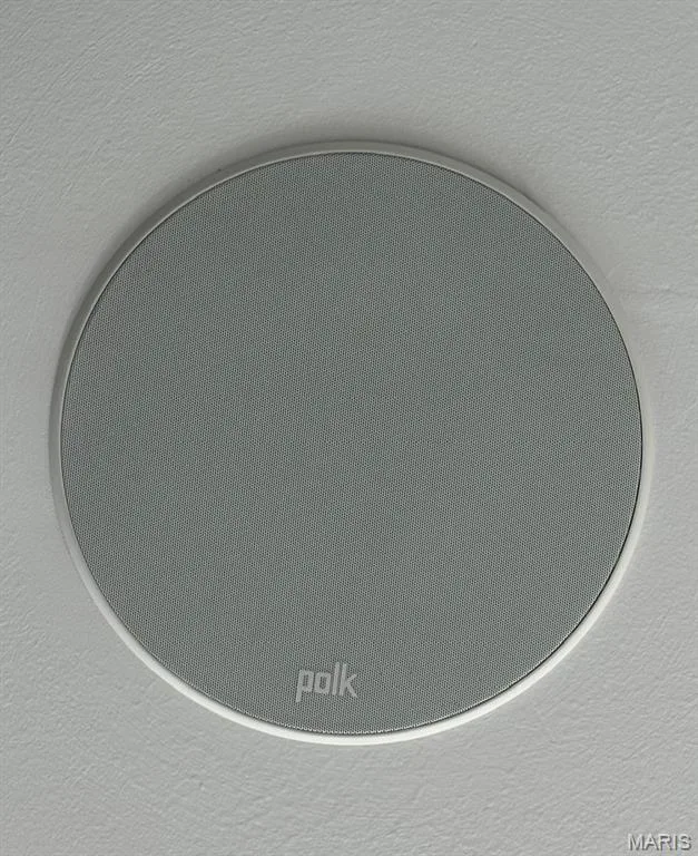 Integrated ceiling speaker with a circular white bezel — 110 Alta Mira Court, Dardenne Prairie, MO 63368