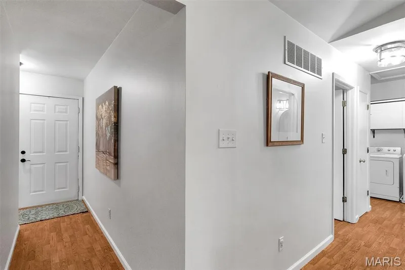 Foyer and Hallway to 3 Bedrooms and Laundry — 104 Cedar Crest Court, St Charles, MO 63304