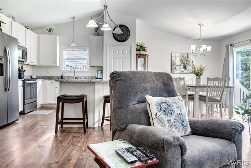View from the great room to breakfast room area & kitchen — 492 Pleasant Breeze Drive, Wentzville, MO 63385