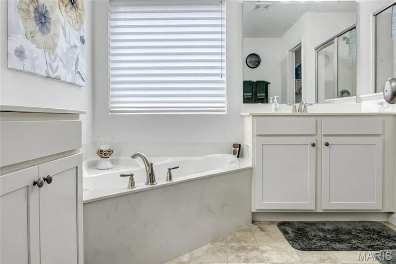 Separate soaker tub in primary bathroom — 492 Pleasant Breeze Drive, Wentzville, MO 63385