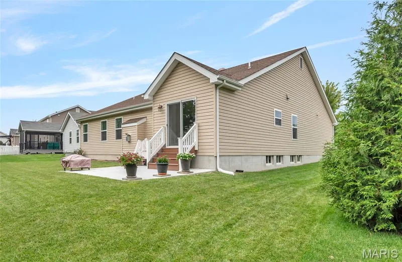 View of the patio in rear of the home off of breakfast room area — 492 Pleasant Breeze Drive, Wentzville, MO 63385