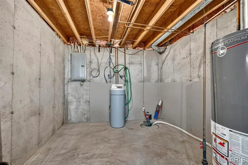 Exposed ceiling joists with visible electrical conduit and plumbing lines — 669 Homerun Drive, O'Fallon, MO 63366