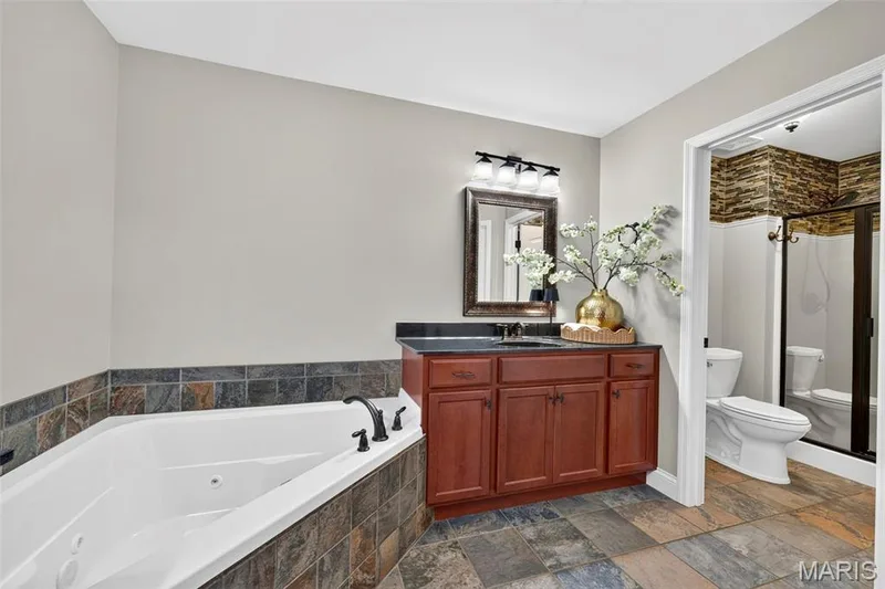soaking tub, separate shower, 2 adult height vanities — 132 Miranda Court, Wentzville, MO 63385