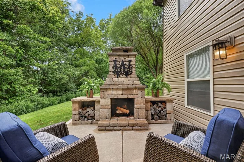 cozy fireplace is perfect for those fall evenings — 132 Miranda Court, Wentzville, MO 63385