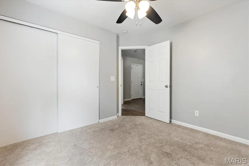 Another view of the additional bedroom with ample closet storage tucked right off the main living area. — 146 Tuscany Lane, Wentzville, MO 63385