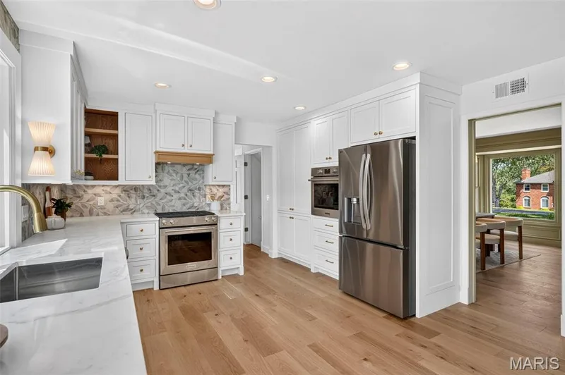 spacious kitchen with quartz countertops — 2251 Whitby Road, Chesterfield, MO 63017