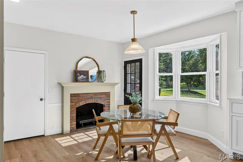 Eat in kitchen with a door to the back patio. Convenient access to the attached garage. — 2251 Whitby Road, Chesterfield, MO 63017