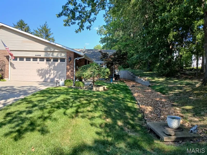 Front of Home with side Walkway to Entry. — 2498 Fox Bridge Court #19, Lake St. Louis, MO 63367