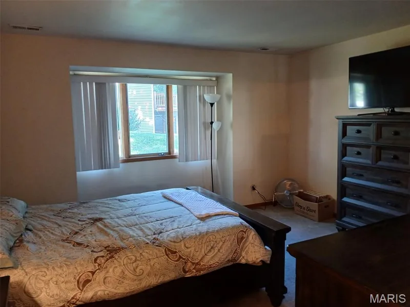 Bedroom with natural light. — 2498 Fox Bridge Court #19, Lake St. Louis, MO 63367