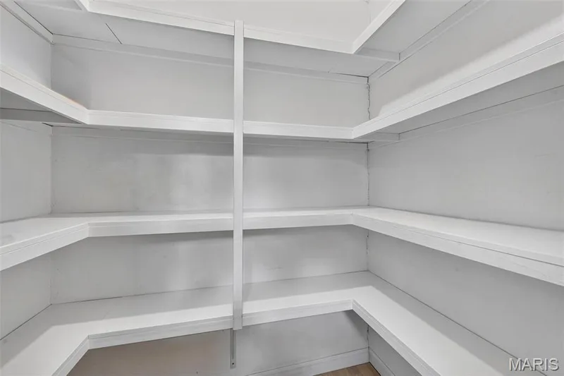 White shelving system providing ample storage space — 1319 Brandywine Lane, St Peters, MO 63376