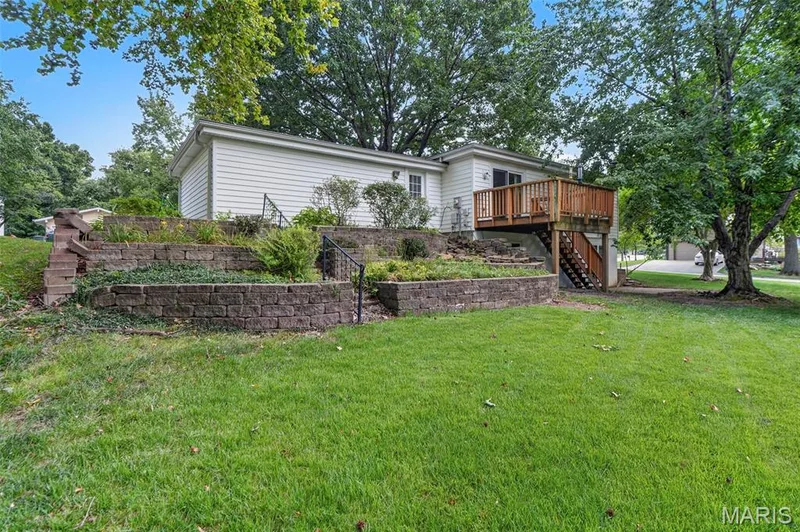 Charming manufactured home situated on an elevated lot with mature landscaping — 1319 Brandywine Lane, St Peters, MO 63376