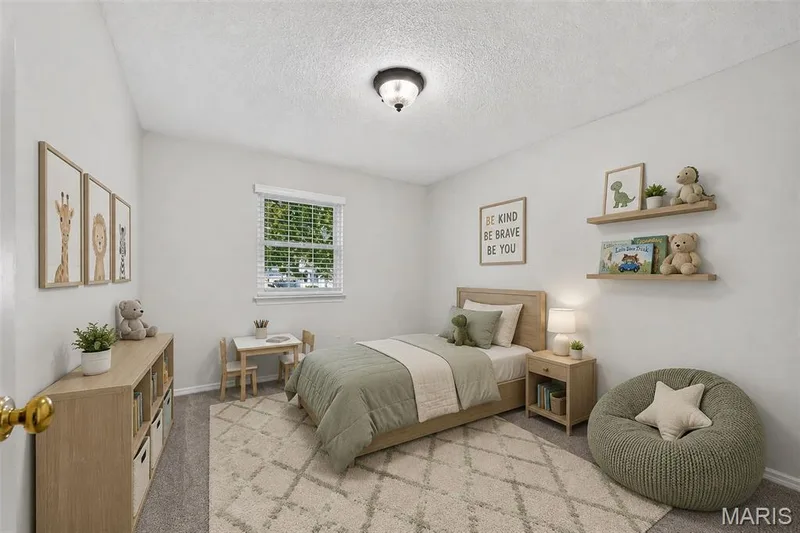 Neutral wall color with a textured ceiling — 1319 Brandywine Lane, St Peters, MO 63376