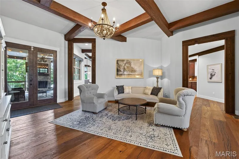 Stunning chandelier in living room and 8' interior doors — 1950 Diehr Road, Wentzville, MO 63385