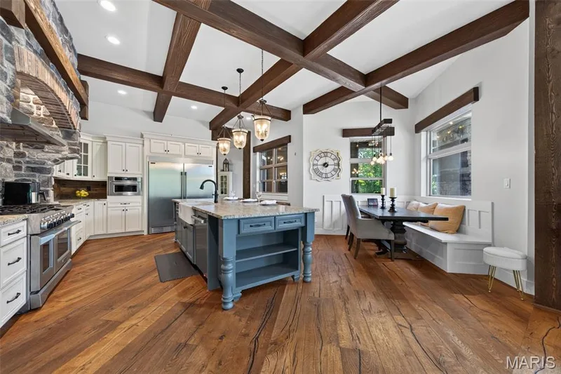 Center island breakfast bar with granite countertops — 1950 Diehr Road, Wentzville, MO 63385
