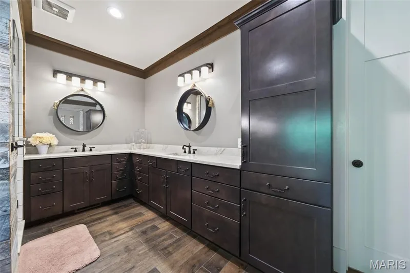 Dual sinks with granite counters and storage cabinets — 1950 Diehr Road, Wentzville, MO 63385