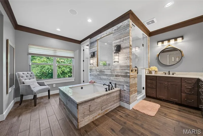 Relax and unwind in this spa-inspired primary bathroom — 1950 Diehr Road, Wentzville, MO 63385