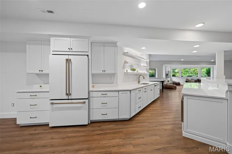 Kitchen with fridge, dishwasher, microwave, & beverage cooler — 1950 Diehr Road, Wentzville, MO 63385