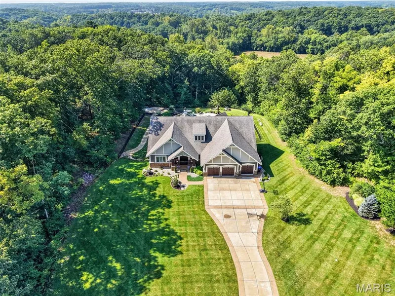 Oversized 3 car garage provides ample space for vehicles and storage — 1950 Diehr Road, Wentzville, MO 63385