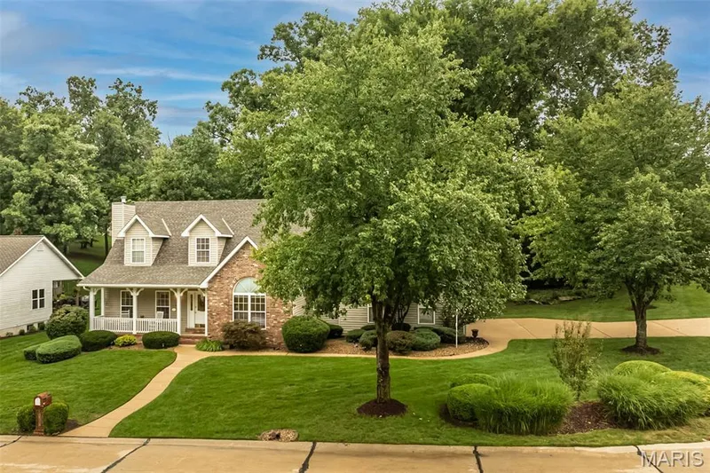 Beautiful corner lot with side entry garage — 868 Natchez Drive, St Charles, MO 63303