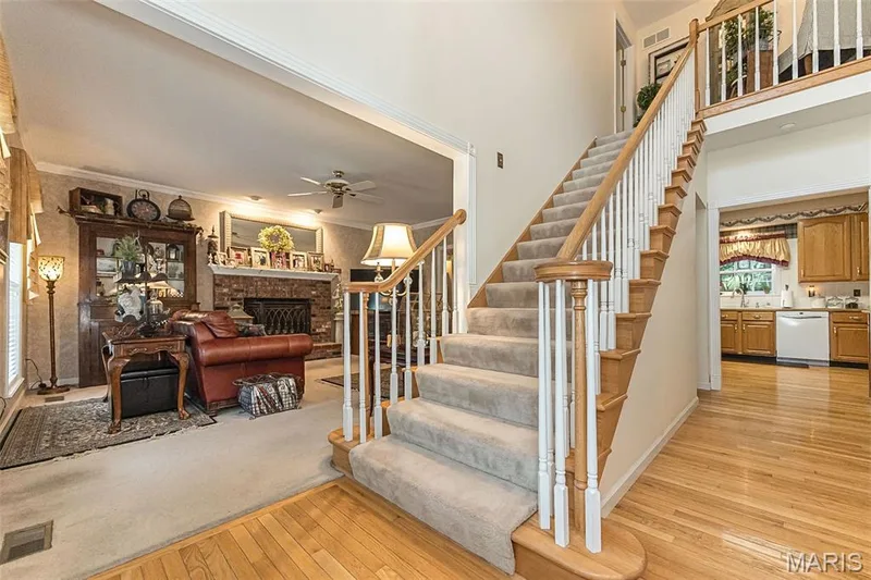 Grand 2 story entry features chandeliers, wood floors and plenty of natural light! — 868 Natchez Drive, St Charles, MO 63303