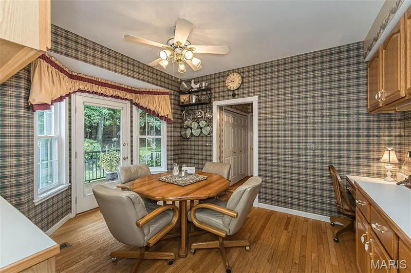 The breakfast room flows out to the back patio for BBQ's and entertaining! — 868 Natchez Drive, St Charles, MO 63303
