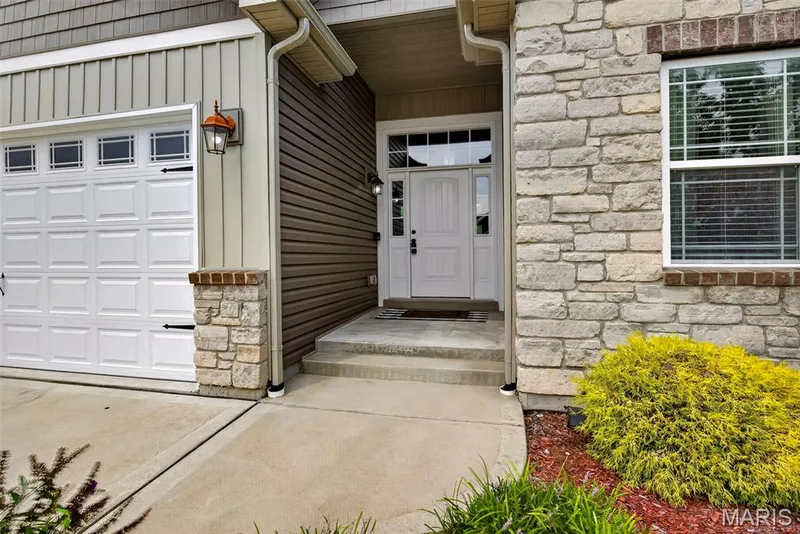 Covered front entry to keep your guests and deliveries dry — 103 Pomodora Circle, Wentzville, MO 63385