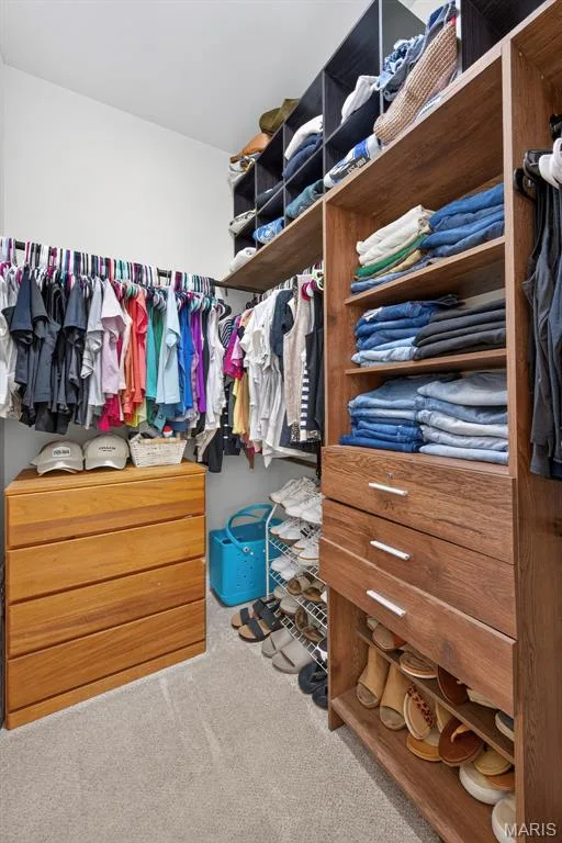 Walk-in closet with custom shelving system — 103 Pomodora Circle, Wentzville, MO 63385