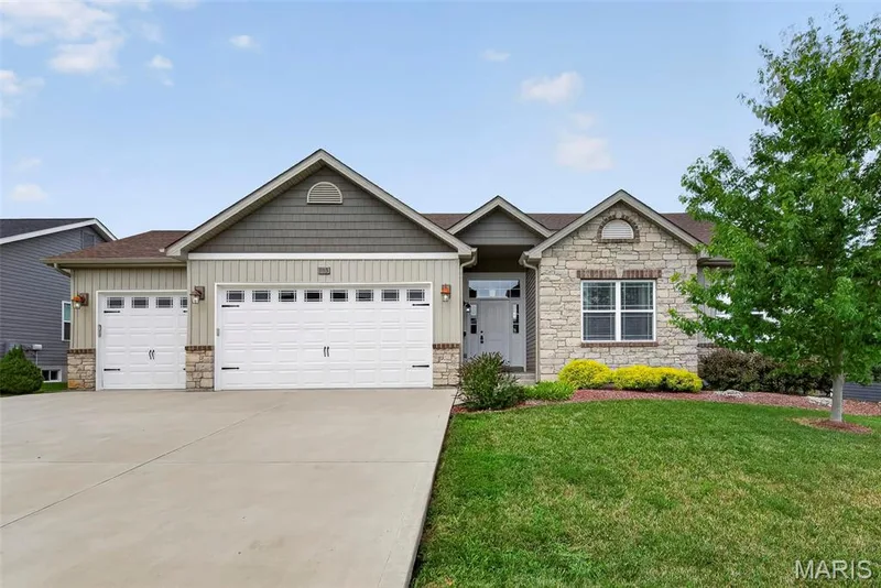 Classic curb appeal and exceptional finishes. No need to build. Everything you need is here! — 103 Pomodora Circle, Wentzville, MO 63385