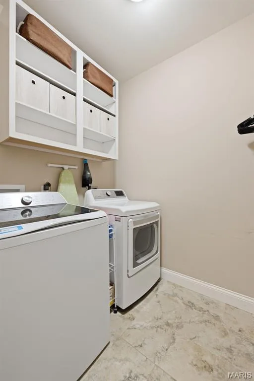 Just off the kitchen you will find laundry room and utility closer. Easy access to 3 car garage — 103 Pomodora Circle, Wentzville, MO 63385