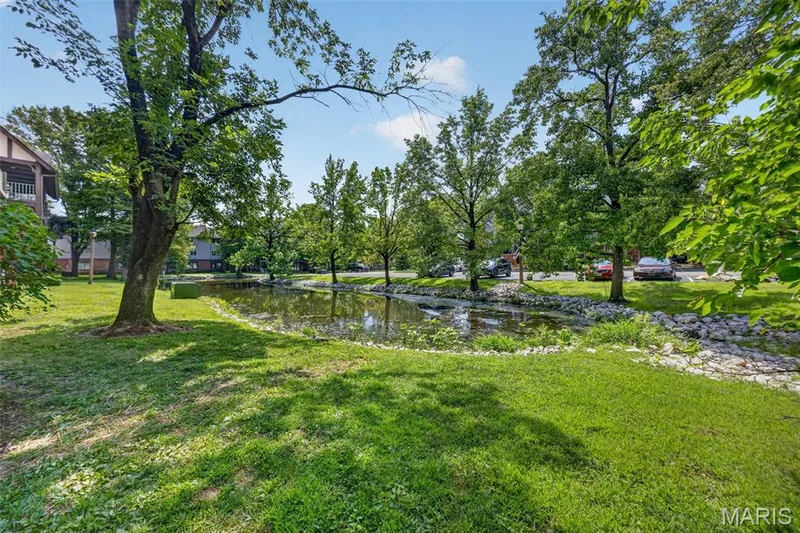 VIEW FROM LIVING ROOM DECK — 1440 Heritage Landing #201, St Charles, MO 63303