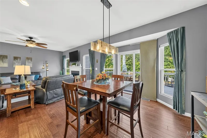 Breakfast area features a bay window and walks out to a spacious deck. — 1125 Crystal Creek Parkway, Wentzville, MO 63385