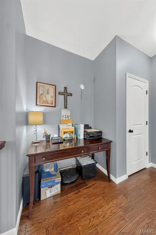 Off the living room is a niche that can serve many purposes.  Desk, display cabinet, or a ready nook. — 1125 Crystal Creek Parkway, Wentzville, MO 63385