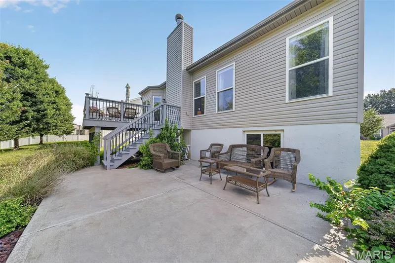 Back yard offers a nice patio area for entertaining. — 1125 Crystal Creek Parkway, Wentzville, MO 63385