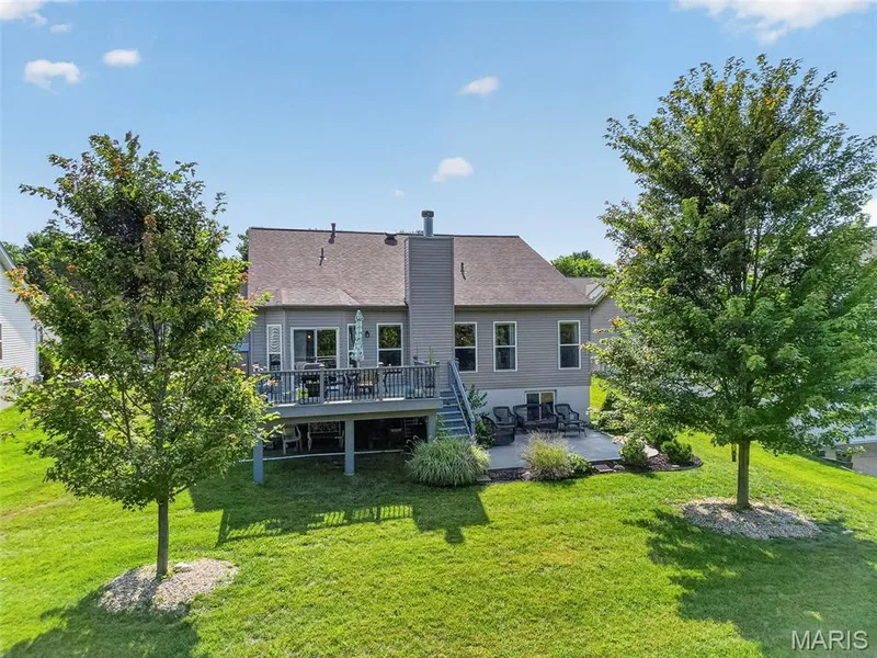 A spacious yard for outdoor activities. — 1125 Crystal Creek Parkway, Wentzville, MO 63385