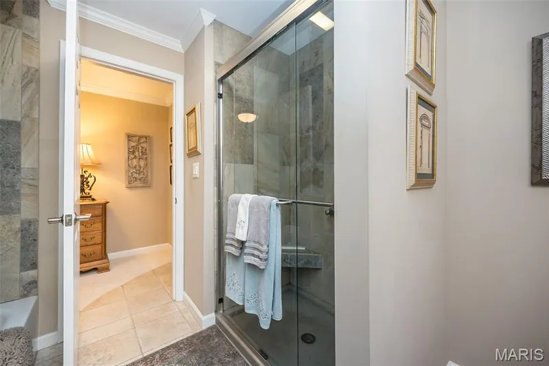 Separate tub and shower in the Jack and Jill bath. — 1512 Bedford Forge Court #19, Chesterfield, MO 63017