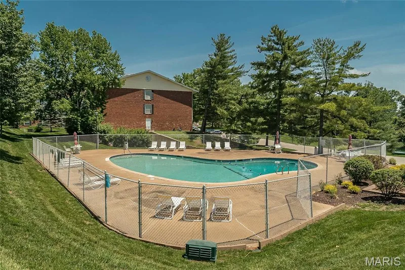Community pool with a patio — 1512 Bedford Forge Court #19, Chesterfield, MO 63017