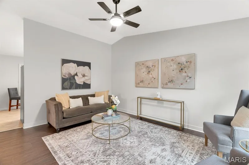 Main level has been freshly remodeled with new flooring, new paint, and new light fixtures — 324 Westminster Drive, St Peters, MO 63376