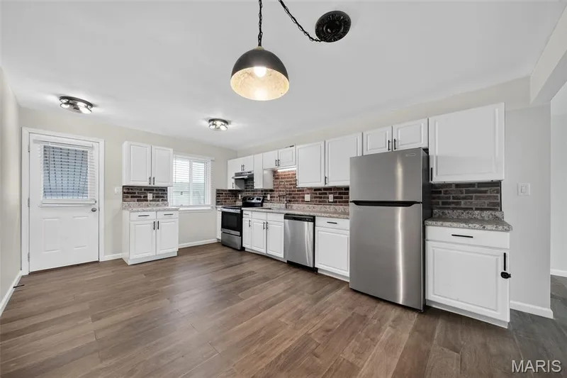 Kitchen and Dining Area — 1823 Gascony Parc Drive #1823, Lake St. Louis, MO 63367