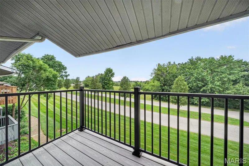 Updated covered balcony right off the living room area — 1823 Gascony Parc Drive #1823, Lake St. Louis, MO 63367